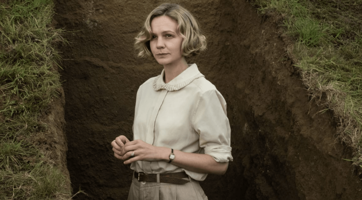 <p><strong>"The Dig"</strong></p>
<p>Филмът на Саймън Стоун е базиран на романа на Джон Престън, който, от своя страна, е по истински случай. В основата на сюжета е разкриването на съкровището Сътън Ху – колекция от англо-саксонски артефакти, през 30-те години.</p>
<p>Те са заровени във владенията на вдовицата Едит Прити в английската провинция. В ролята на Прити повече от успешно влиза Кери Мълиган, а Ралф Файнс играе в образа на Бейзил Браун. Той е опитен археолог, на когото жената се доверява и му предоставя земята си за работа.</p>
<p>Героят на Файнс е човекът, който първи открива златото и скъпоценните камъни. Те разказват историята на далечните поколения, живели преди хиляди години, и са в основата на платоничната връзка, която се изгражда между Прити и Браун.</p>
<p>Това е разказ за двама души, които сътворяват история и оставят наследство на бъдещите поколения.</p>
<p>Филмът е достъпен в Netflix.</p>
