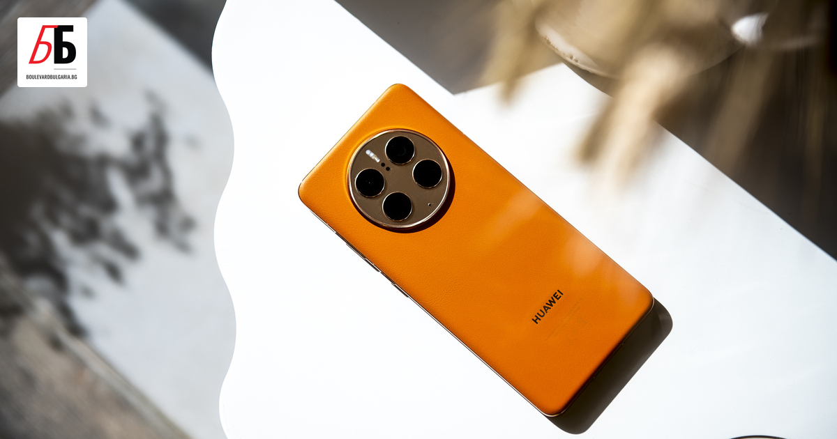 Той е оранжев, рамката му е като златна, камерата заема