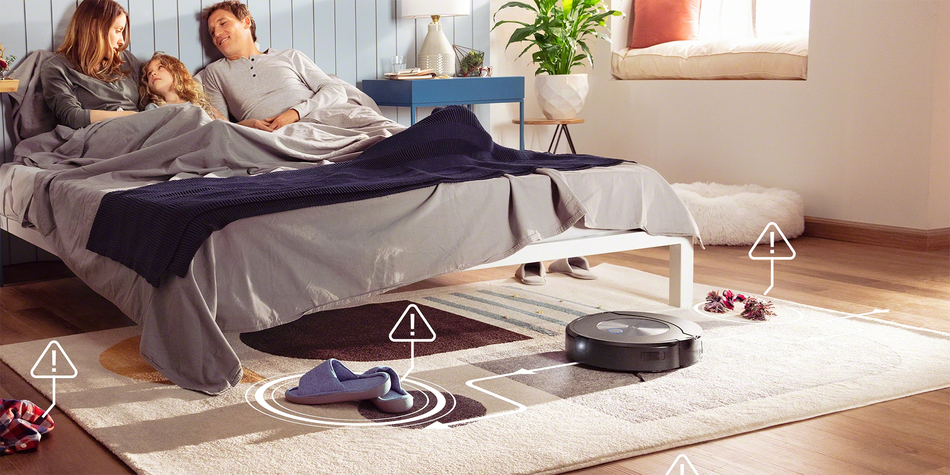 iRobot j7 family in bed