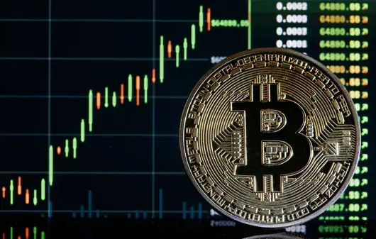Биткойн счупи исторически рекорд и прескочи цена от 69 000 долара