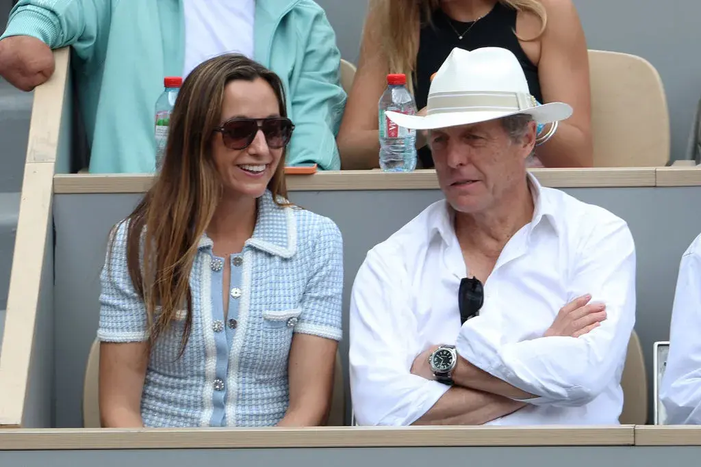 Хю Грант и Анна Елизабет Ебърстийн