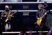 Китаристът на Oasis Bonehead се оттегля от турнето заради рак на простатата
